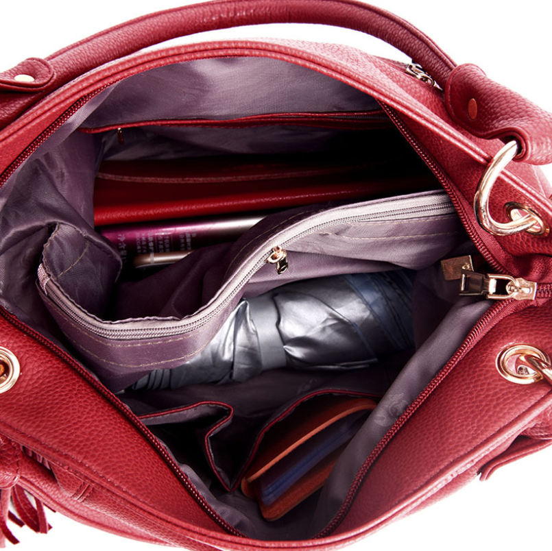 Leather tassel soft leather shoulder bag